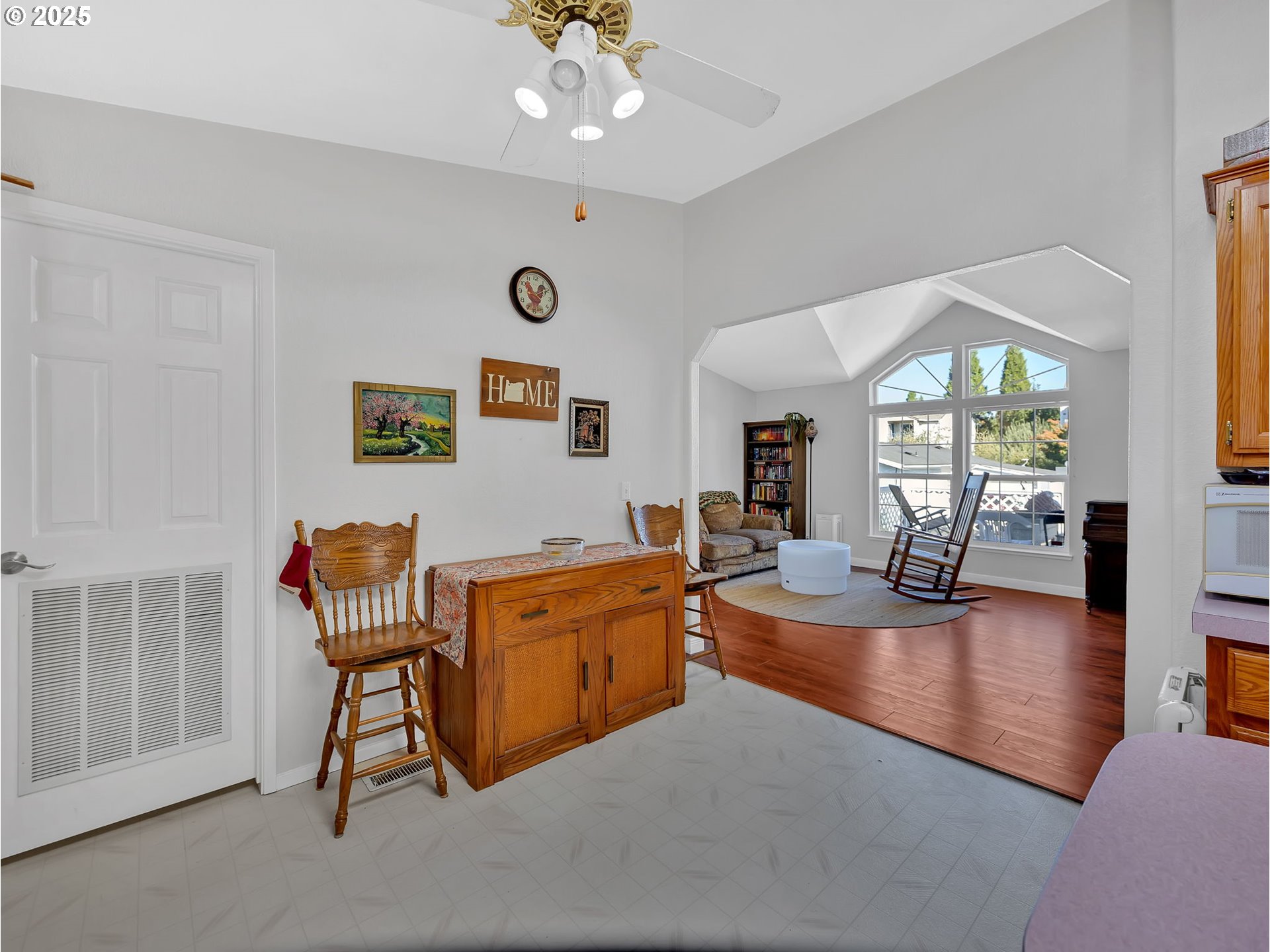 1819 Southeast Orient Drive, Unit 8 Gresham, OR 97080 - Photo 16 of 30 a living room with furniture and a large window