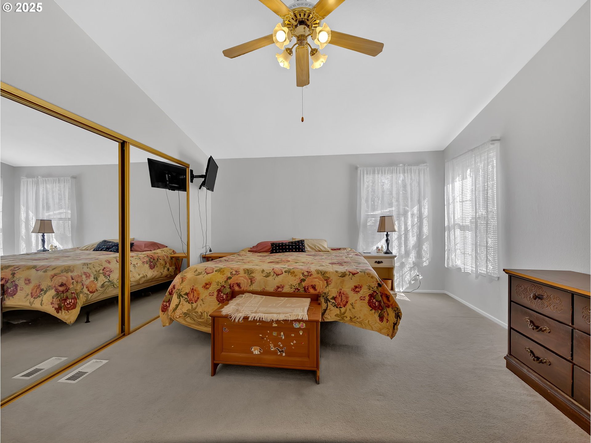 1819 Southeast Orient Drive, Unit 8 Gresham, OR 97080 - Photo 19 of 30 a bedroom with a bed and a chandelier