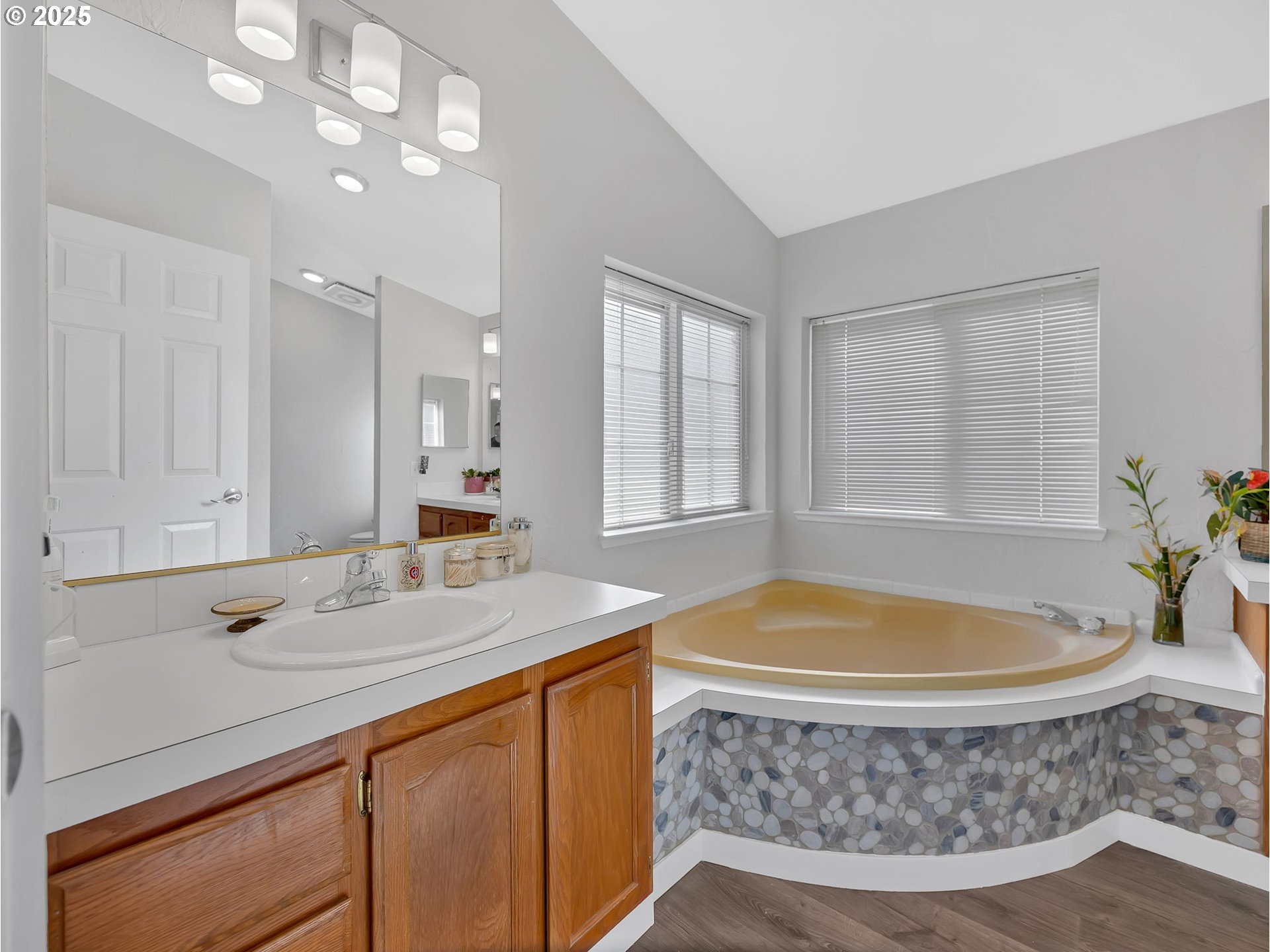 1819 Southeast Orient Drive, Unit 8 Gresham, OR 97080 - Photo 21 of 30 a bathroom with a tub a sink and a window
