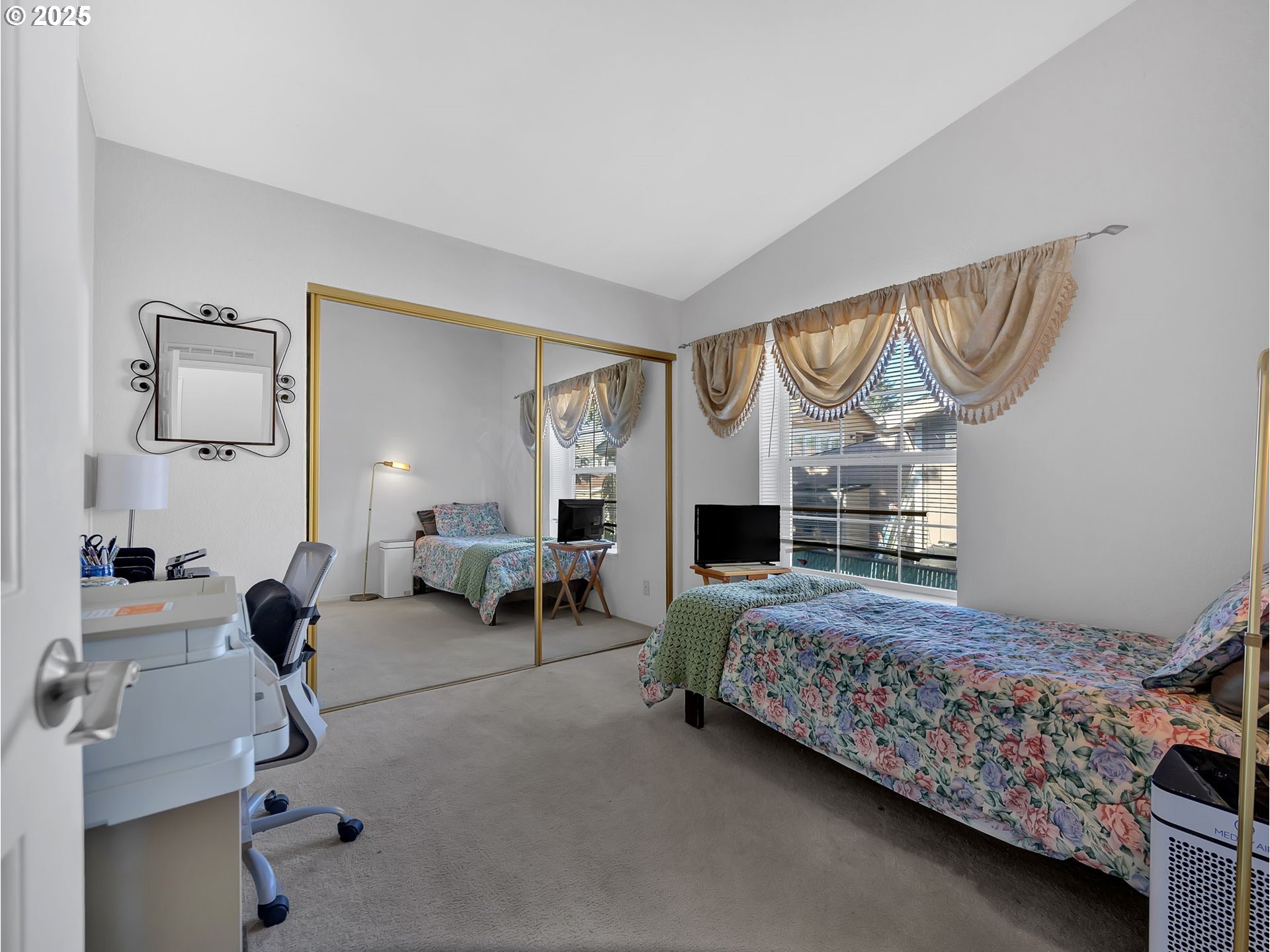 1819 Southeast Orient Drive, Unit 8 Gresham, OR 97080 - Photo 24 of 30 a bedroom with furniture and a fireplace