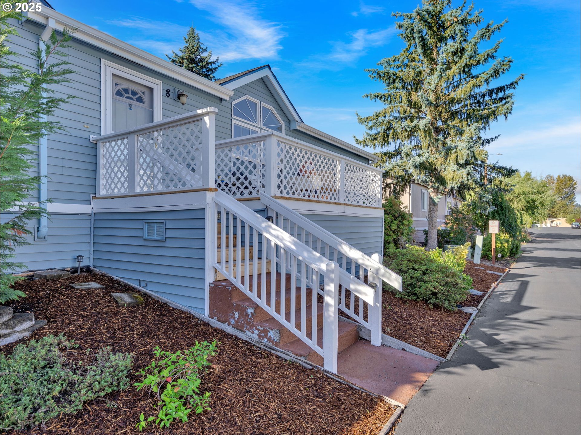 1819 Southeast Orient Drive, Unit 8 Gresham, OR 97080 - Photo 29 of 30 a view of a house with a yard