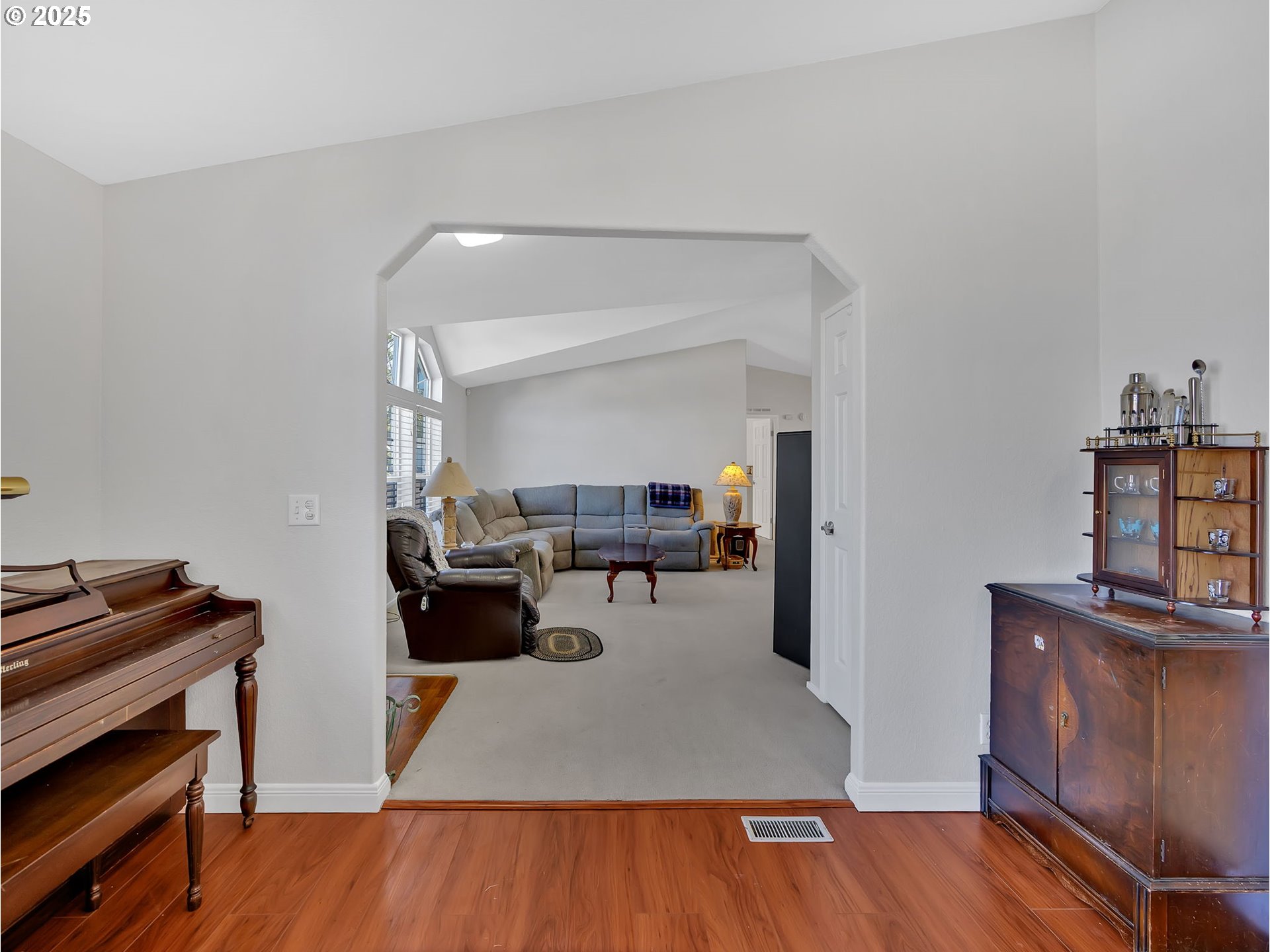 1819 Southeast Orient Drive, Unit 8 Gresham, OR 97080 - Photo 8 of 30 a living room with furniture and a wooden floor