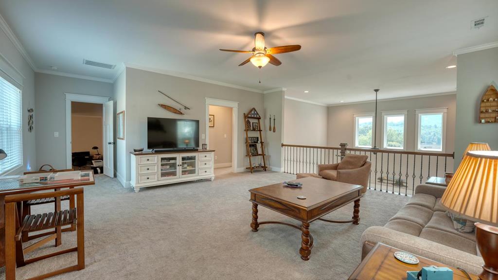 31 Elf School Road Hayesville, NC 28904 - Photo 39 of 59 a living room with furniture and a flat screen tv