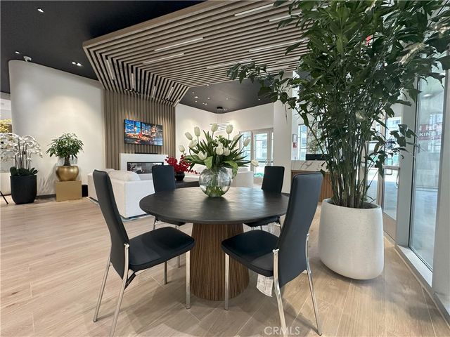 a dinning table and chairs in a patio