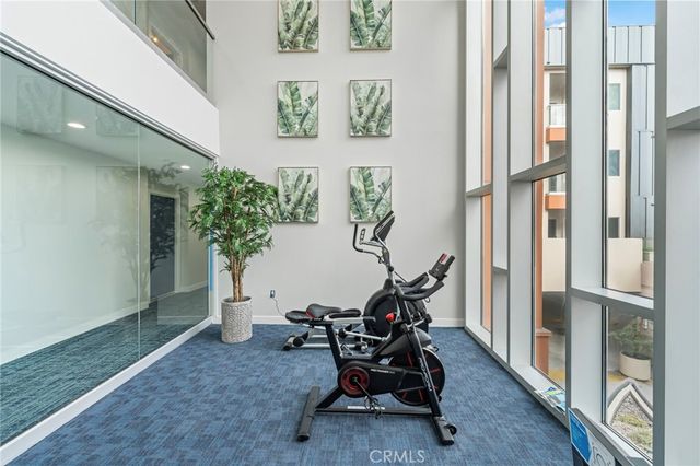a view of a entryway with furniture and floor to ceiling window