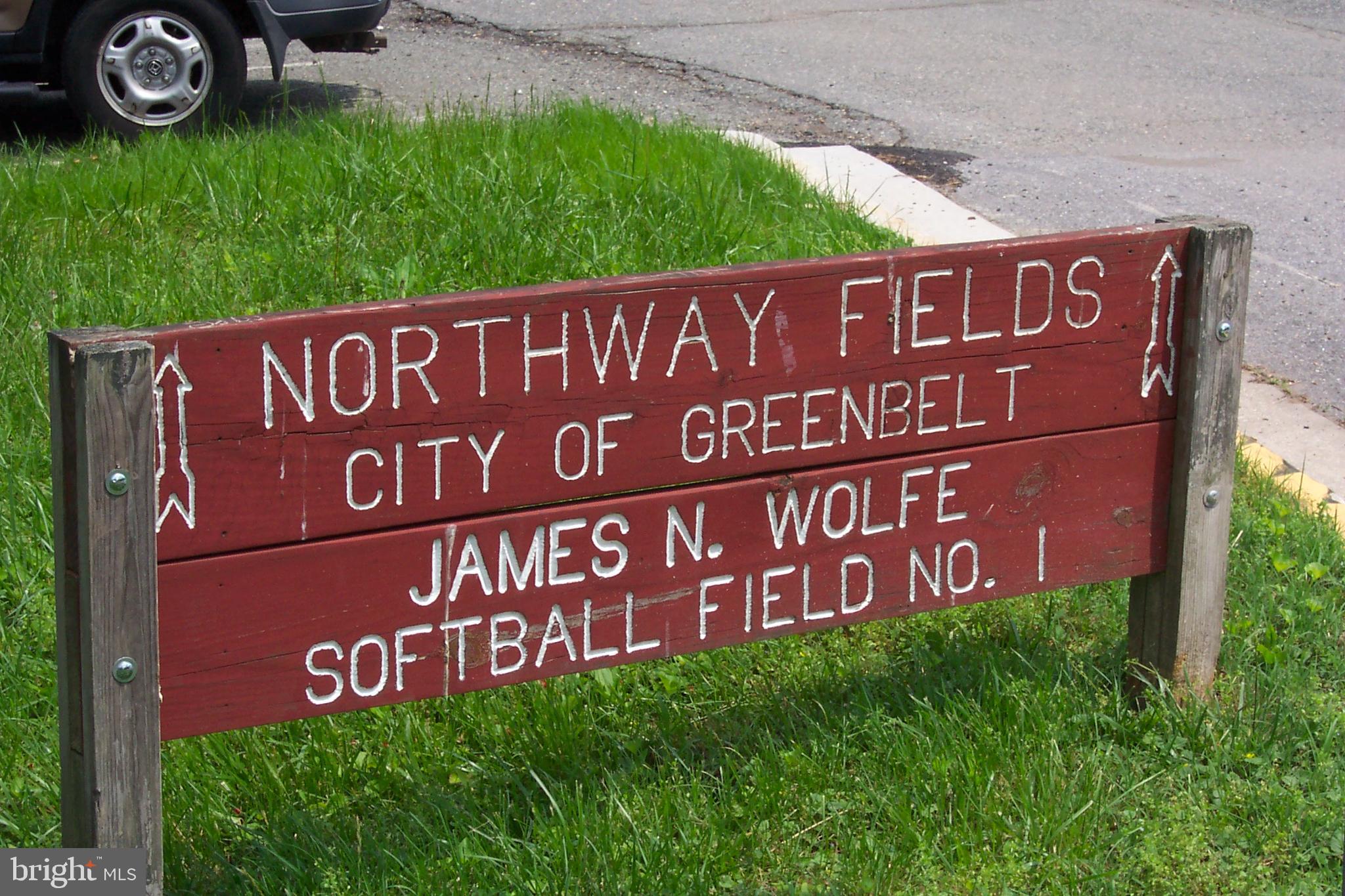 18 Ridge Road Greenbelt, MD 20770 - Photo 28 of 31 a sign broad on a brick wall