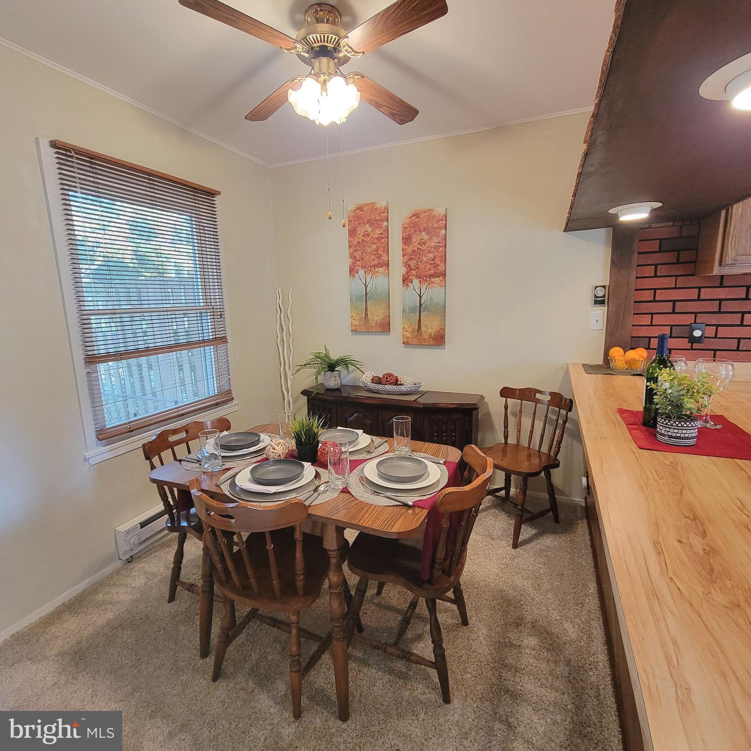18 Ridge Road Greenbelt, MD 20770 - Photo 4 of 31 a dining room with furniture and window