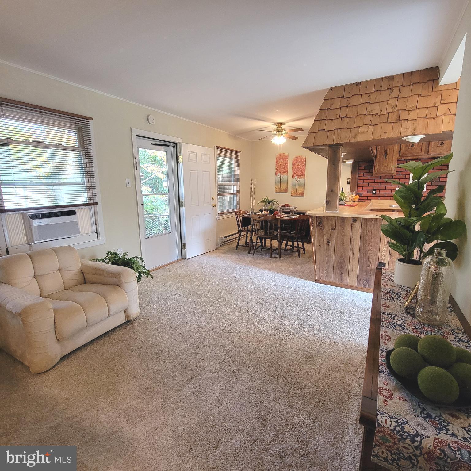 18 Ridge Road Greenbelt, MD 20770 - Photo 5 of 31 a bedroom with furniture and a large window
