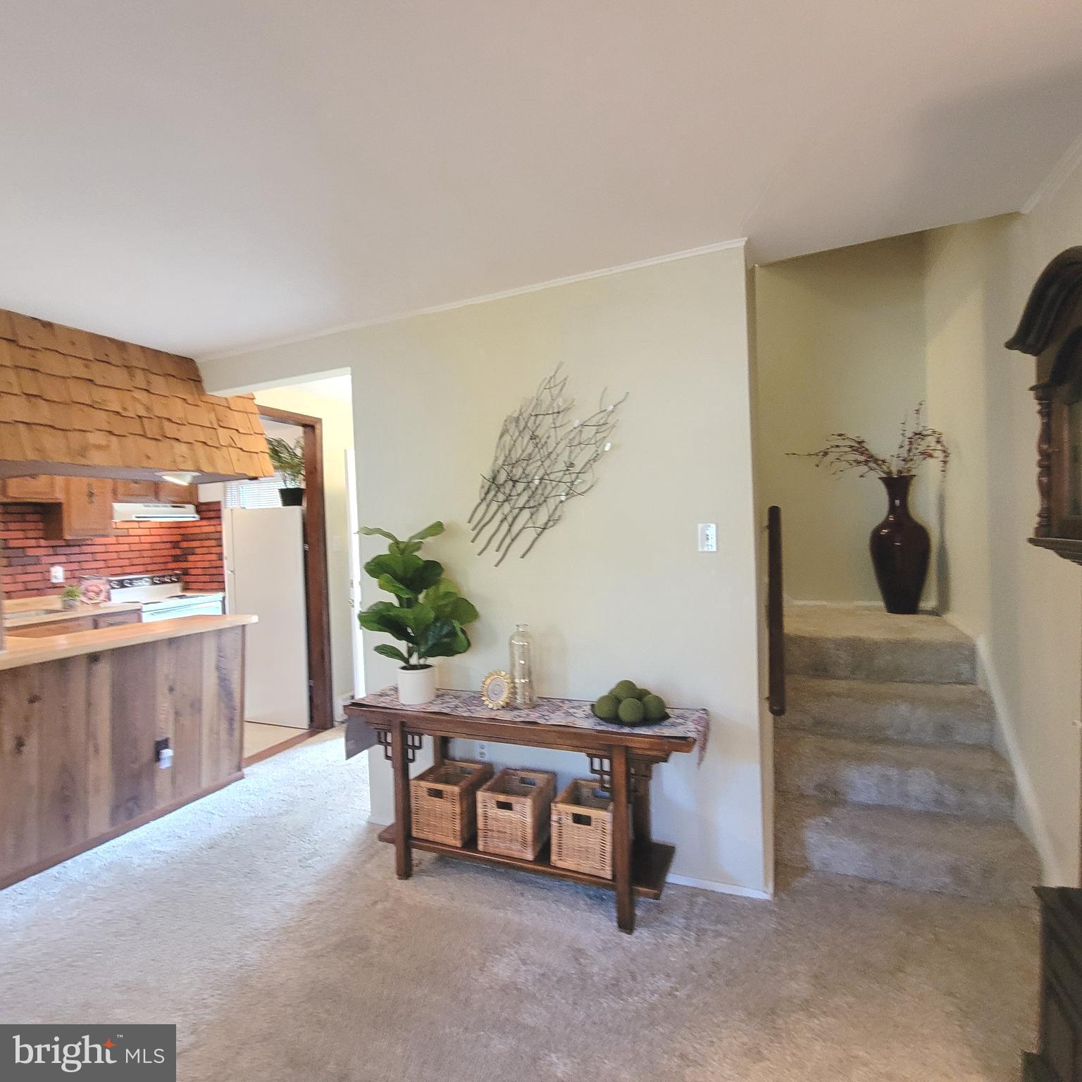 18 Ridge Road Greenbelt, MD 20770 - Photo 9 of 31 a living room with furniture and a table