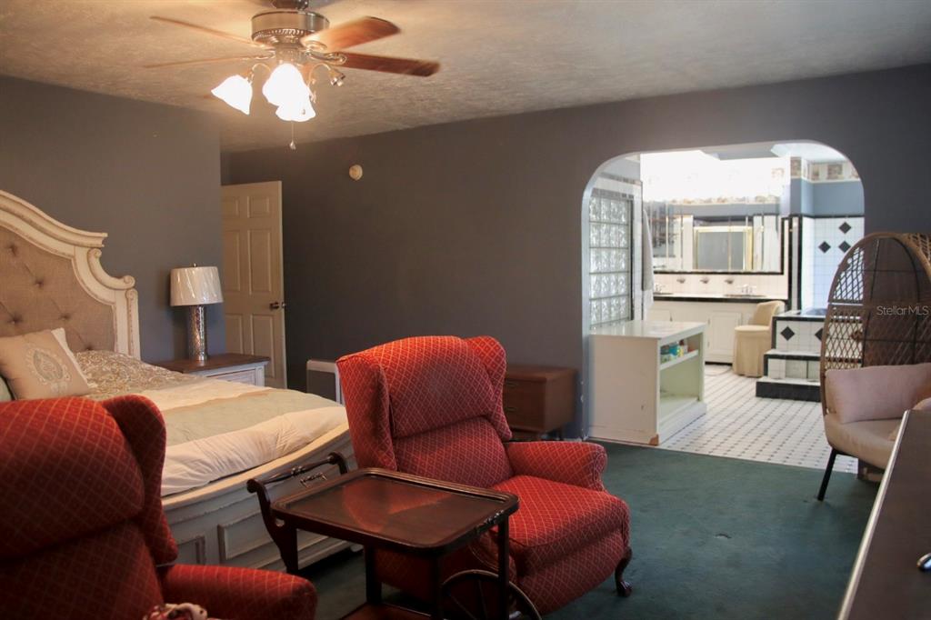 786 Southwest Bozeman Court Lake City, FL 32024 - Photo 15 of 32 a bedroom with furniture and wooden floor