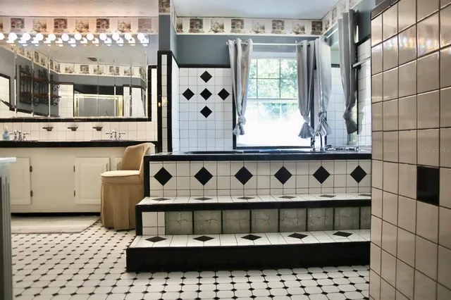 a view of a bathroom with a window