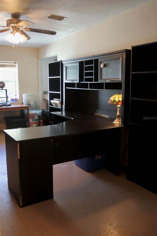 786 Southwest Bozeman Court Lake City, FL 32024 - Photo 20 of 32 a kitchen with a sink and refrigerator