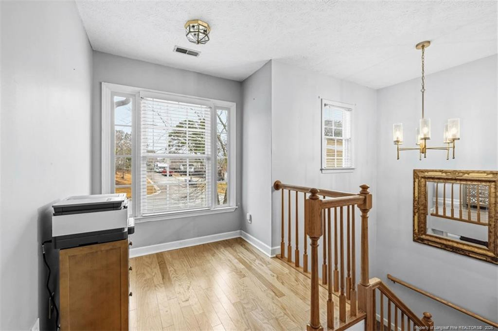 403 Lionshead Road Fayetteville, NC 28311 - Photo 20 of 49 a view of a hallway with windows