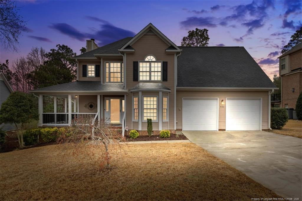 403 Lionshead Road Fayetteville, NC 28311 - Photo 2 of 49 a front view of a house with yard