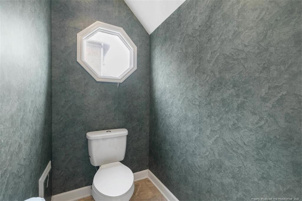 403 Lionshead Road Fayetteville, NC 28311 - Photo 25 of 49 a white toilet sitting next to a white wall