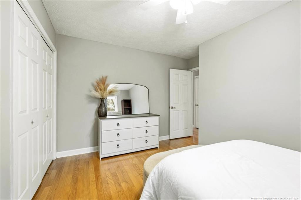 403 Lionshead Road Fayetteville, NC 28311 - Photo 30 of 49 a bedroom with a bed and a dresser