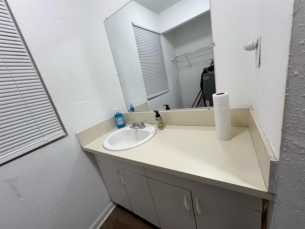 1936 West Cherry Street Tampa, FL 33607 - Photo 21 of 21 a bathroom with a sink and a mirror