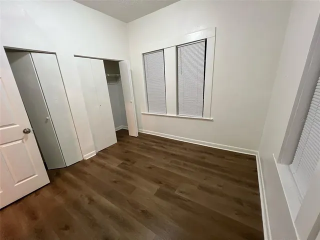 a view of a porch with wooden floor and stairs