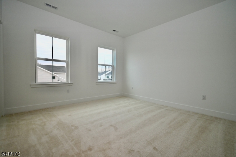 26 Arowana Road Randolph, NJ 07869 - Photo 16 of 26 an empty room with windows