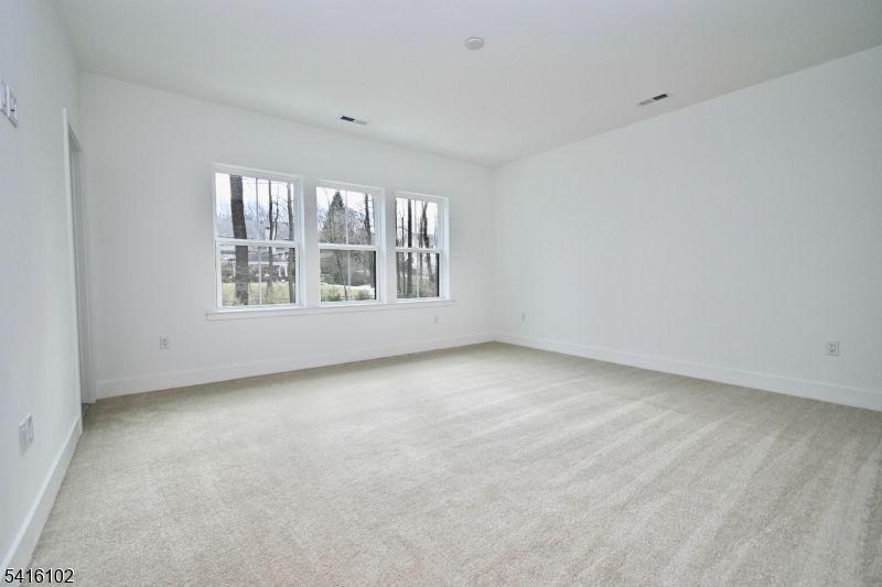 26 Arowana Road Randolph, NJ 07869 - Photo 18 of 26 an empty room with a window