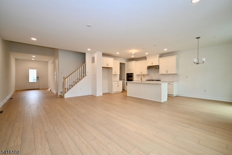 26 Arowana Road Randolph, NJ 07869 - Photo 5 of 26 a view of a kitchen with a sink and a refrigerator