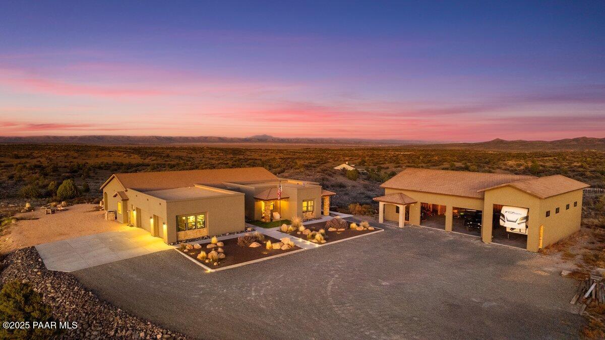 an aerial view of a house with a garden space