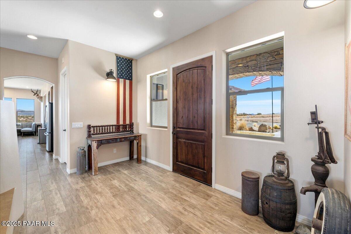 12300 West Slate Road Prescott, AZ 86305 - Photo 3 of 59 a hallway with furniture and a window