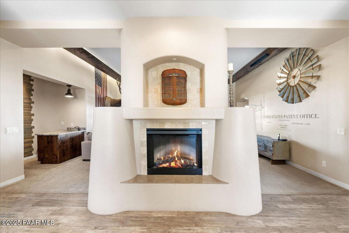 12300 West Slate Road Prescott, AZ 86305 - Photo 4 of 59 a living room with furniture and a fireplace