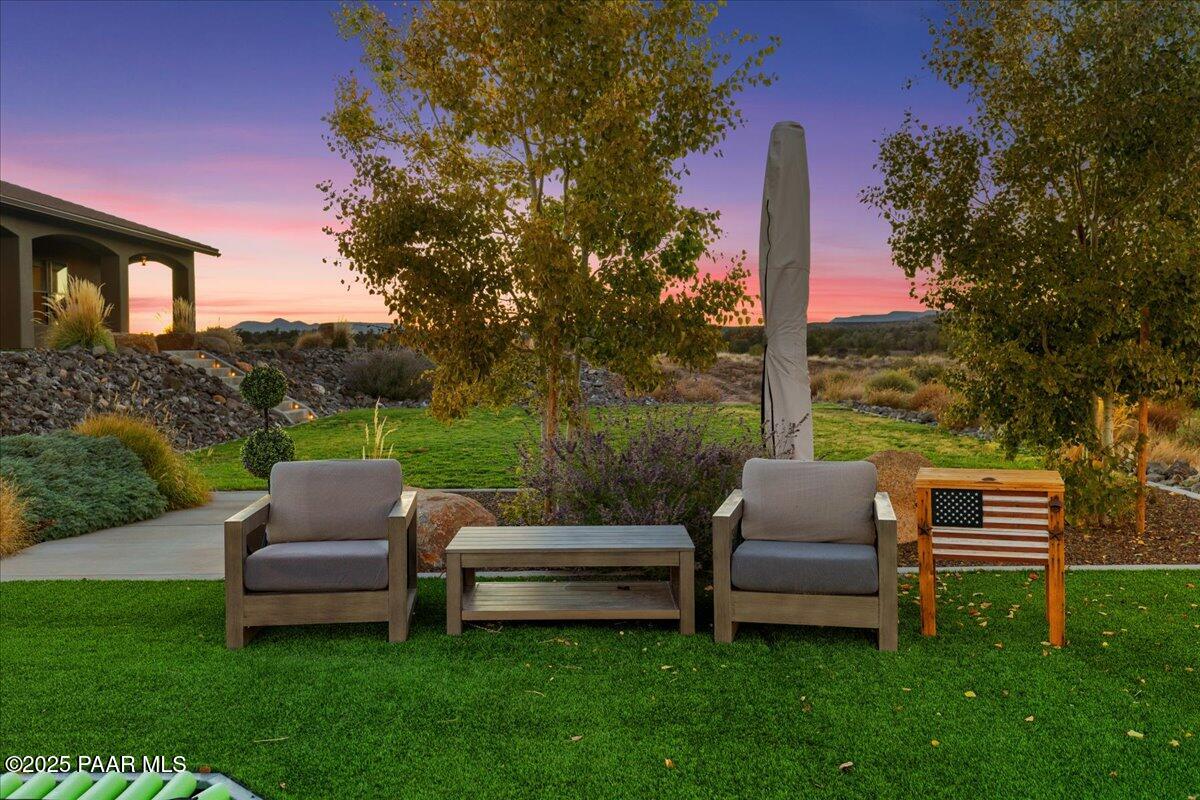 12300 West Slate Road Prescott, AZ 86305 - Photo 42 of 59 a garden view with a seating space