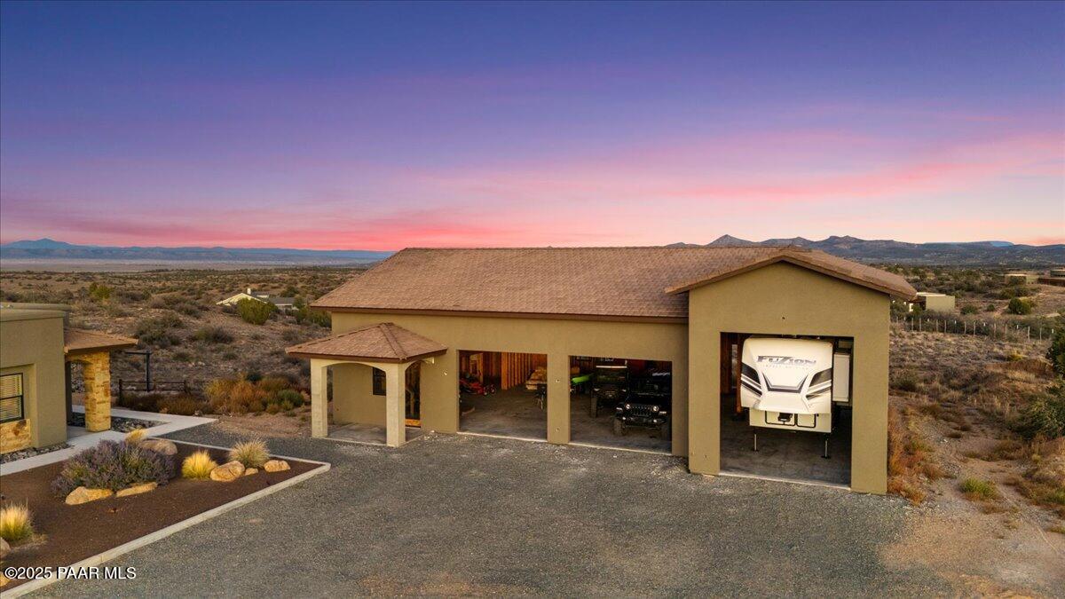 12300 West Slate Road Prescott, AZ 86305 - Photo 50 of 59 front view of a house with a street