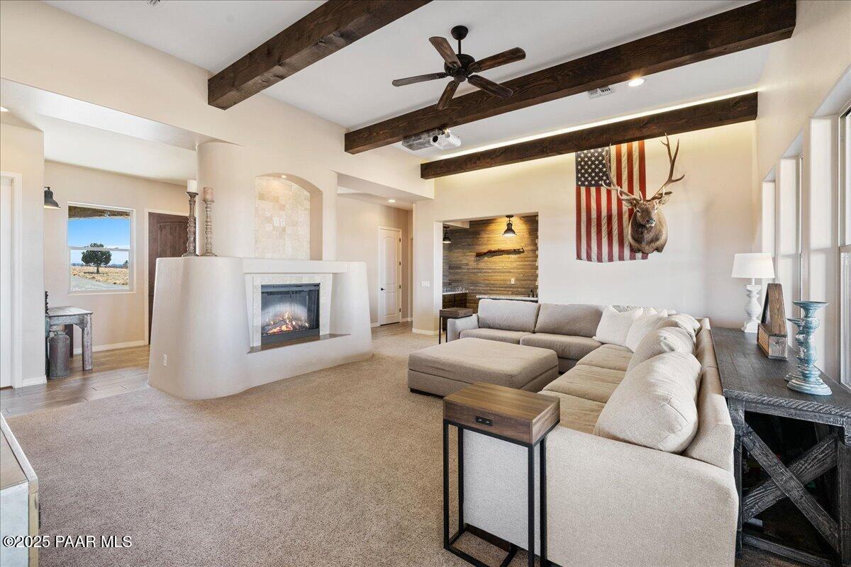 12300 West Slate Road Prescott, AZ 86305 - Photo 5 of 59 a living room with furniture and a fireplace