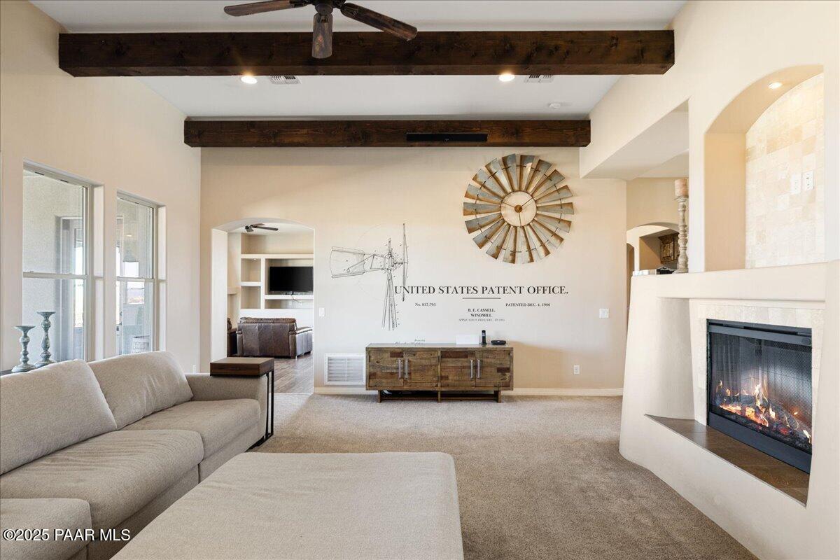 12300 West Slate Road Prescott, AZ 86305 - Photo 6 of 59 a living room with furniture and a fireplace
