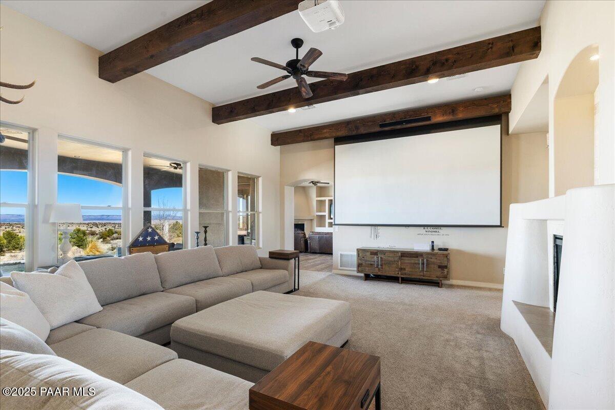 12300 West Slate Road Prescott, AZ 86305 - Photo 7 of 59 a living room with furniture and a flat screen tv