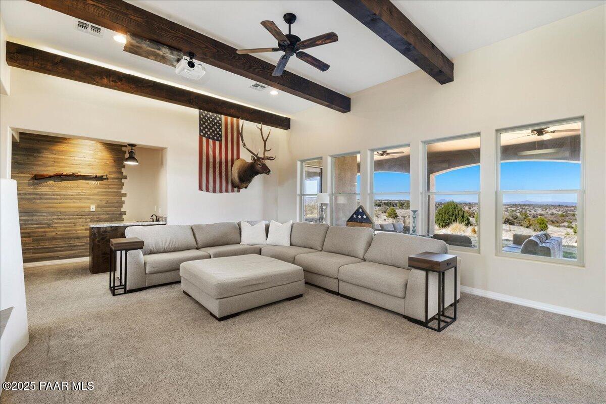 12300 West Slate Road Prescott, AZ 86305 - Photo 8 of 59 a living room with furniture and a large window