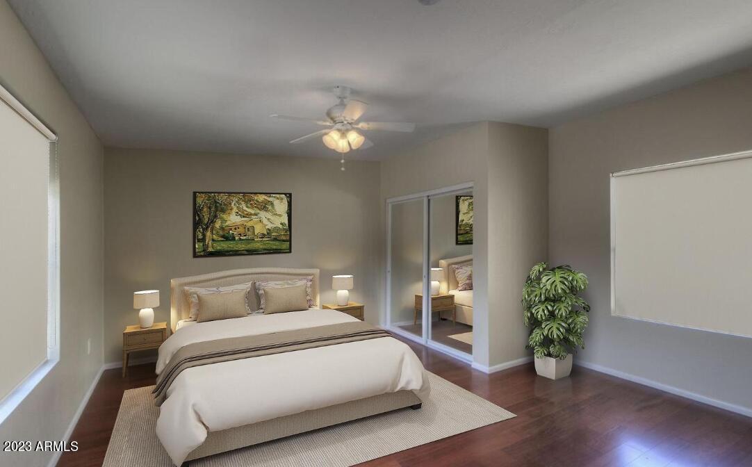 6609 East Phelps Road Scottsdale, AZ 85254 - Photo 21 of 83 a bedroom with a bed and a potted plant