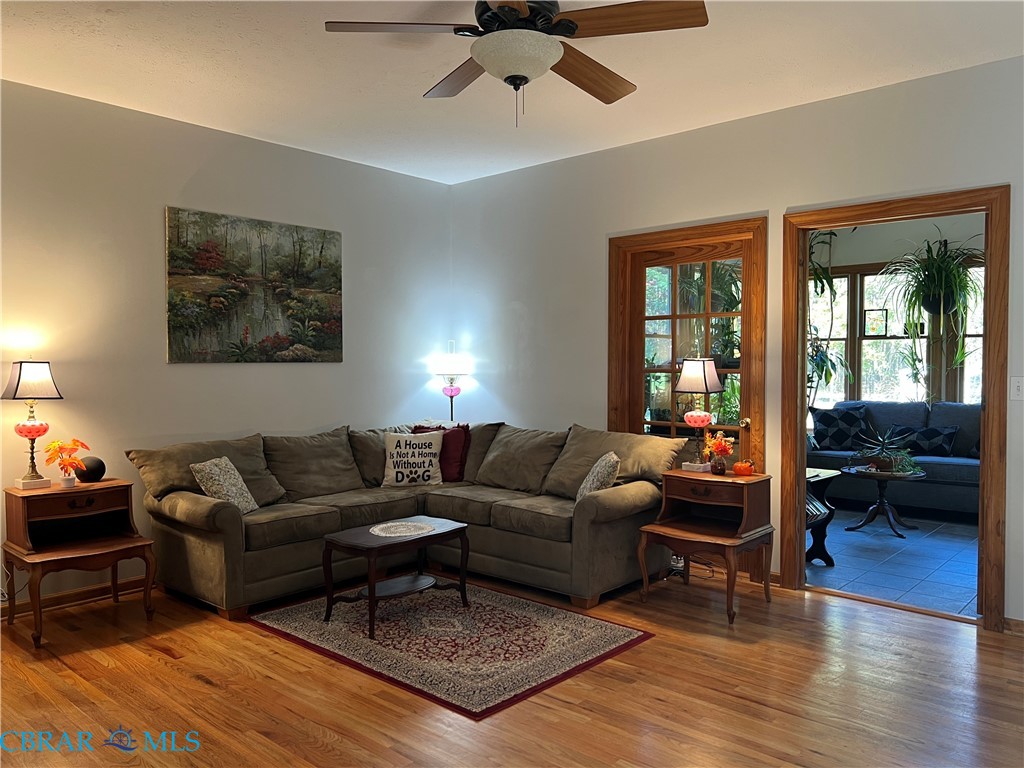 1419 Mill Creek Road Wake, VA 23176 - Photo 25 of 49 Living room featuring wood finished floors and a ceiling fan