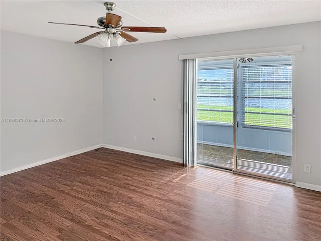 an empty room with fan