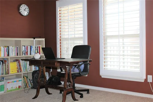 a room with furniture and a window