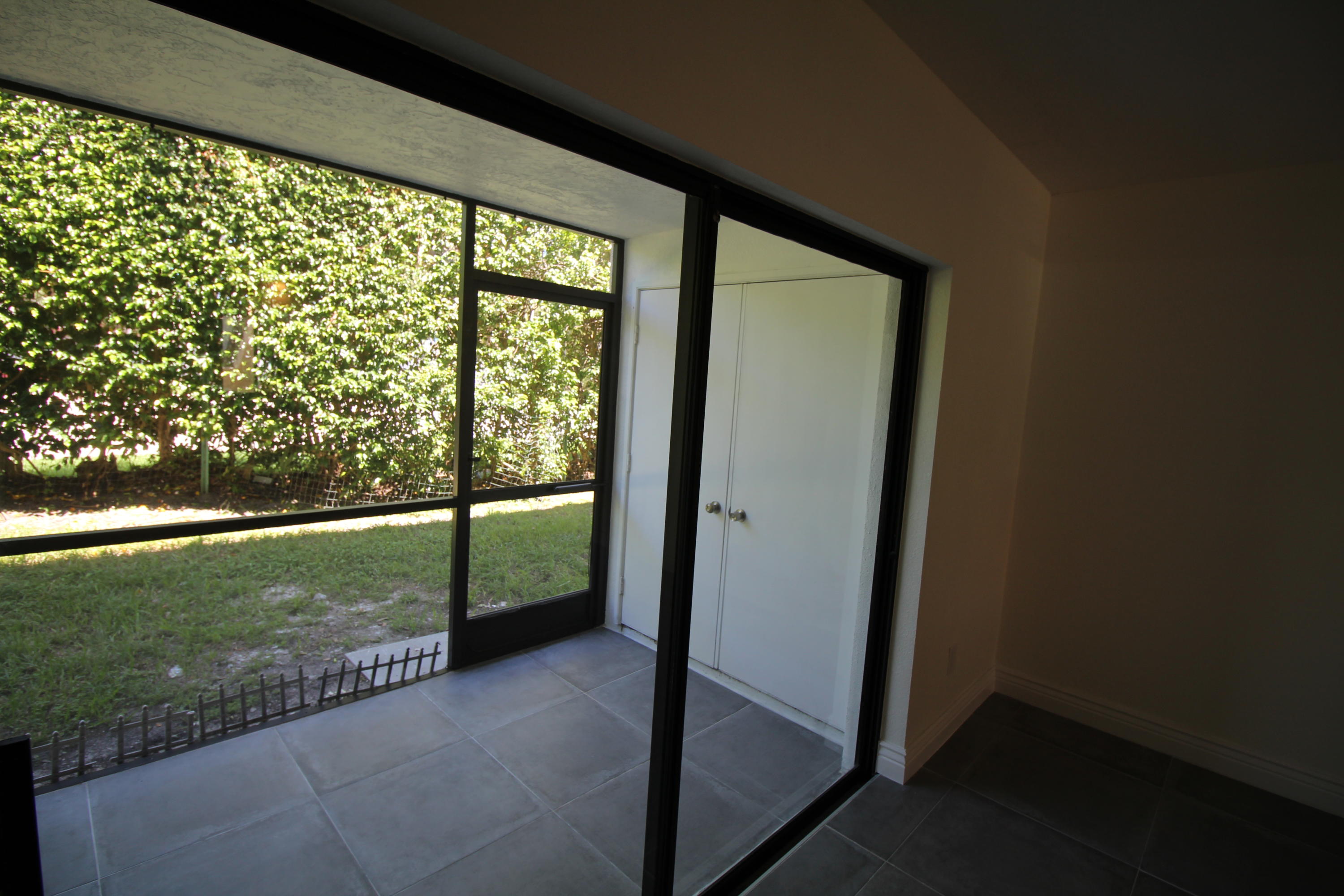 5150 East Club Circle, Unit 104 Boca Raton, FL 33487 - Photo 16 of 23 patio screened