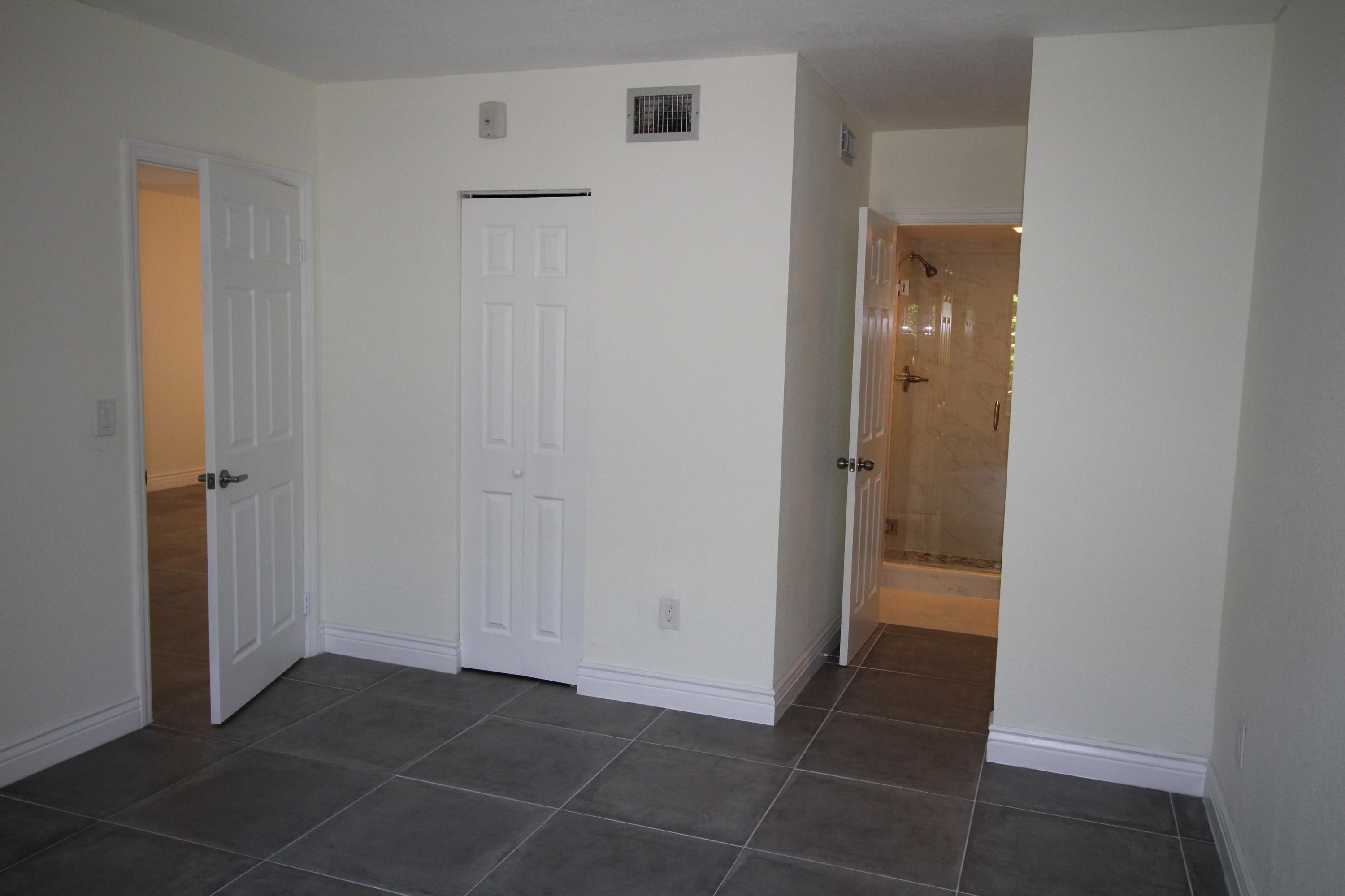 5150 East Club Circle, Unit 104 Boca Raton, FL 33487 - Photo 7 of 23 Master Bedroom