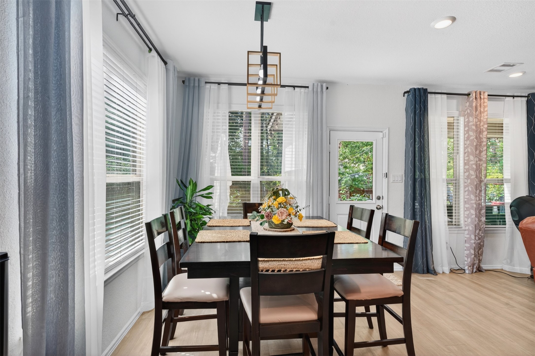 2832 Mistygate Court Conroe, TX 77301 - Photo 11 of 50 Dining area flowing with natural light.