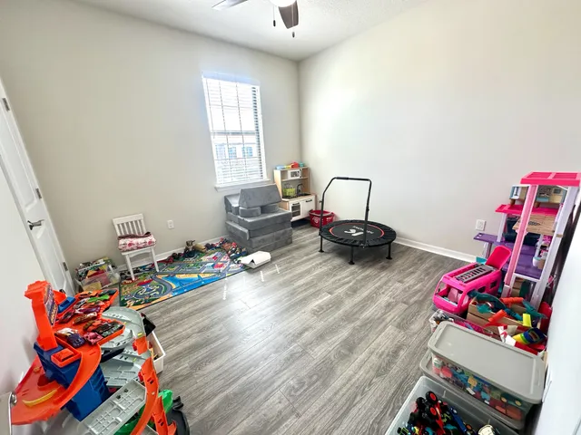 a room with furniture and toys
