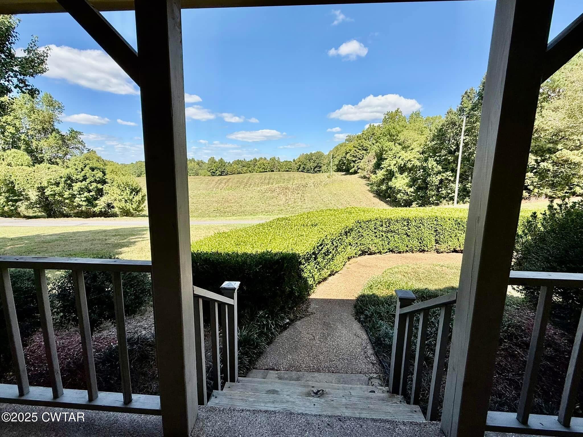 1559 Ella Groom Road Troy, TN 38260 - Photo 8 of 23 a view of a balcony with an ocean view