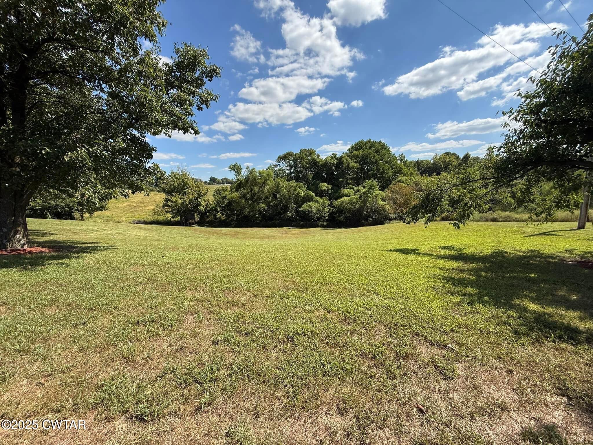 1559 Ella Groom Road Troy, TN 38260 - Photo 10 of 23 a view of an ocean and beach
