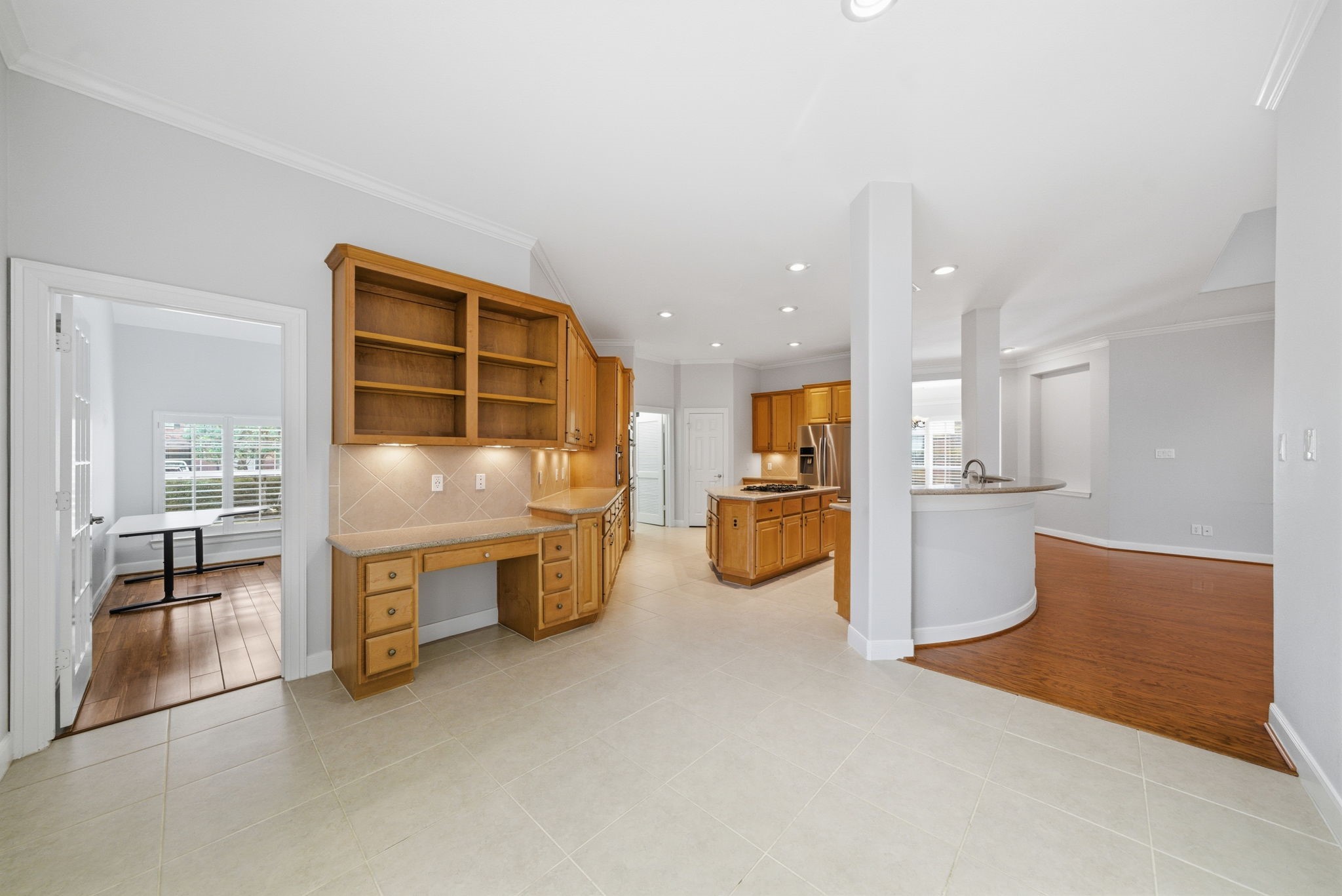 2842 Nicks Run Lane Katy, TX 77494 - Photo 13 of 35 a open kitchen with white cabinets and a sink