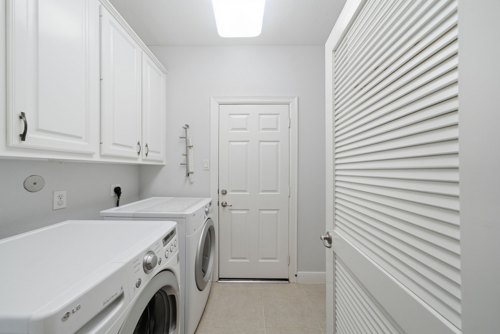 2842 Nicks Run Lane Katy, TX 77494 - Photo 29 of 35 a utility room with dryer and washer