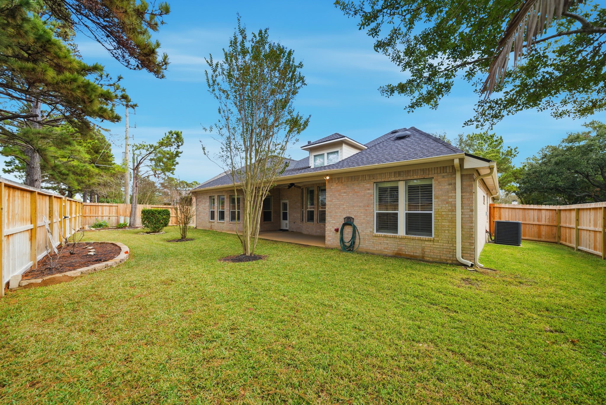 2842 Nicks Run Lane Katy, TX 77494 - Photo 32 of 35 a view of a house with a yard