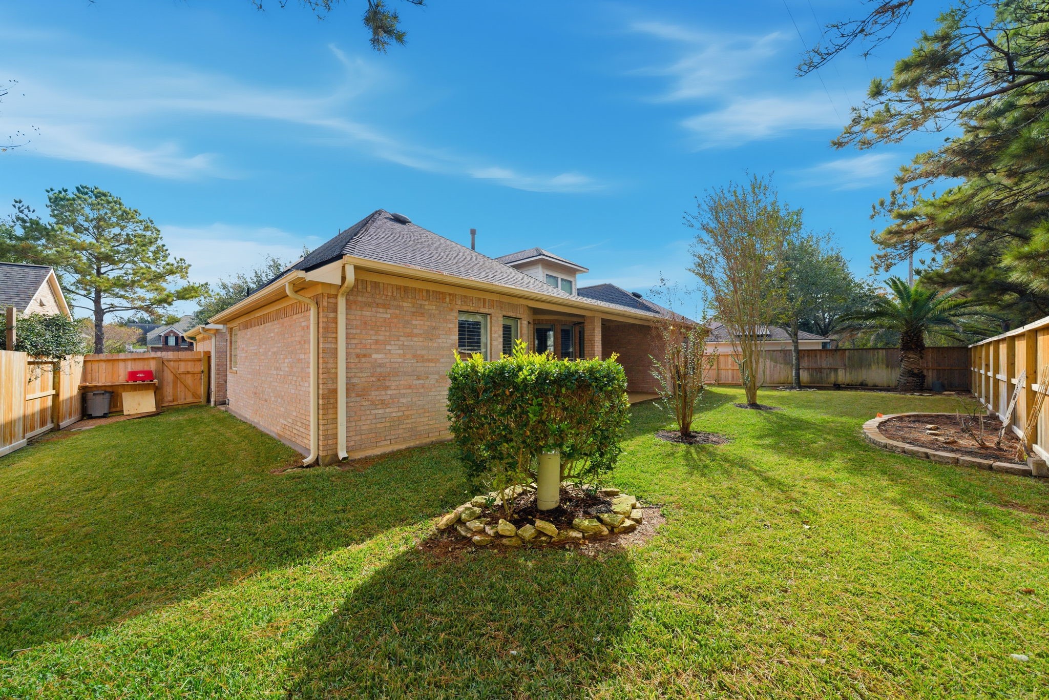 2842 Nicks Run Lane Katy, TX 77494 - Photo 34 of 35 a view of a house with backyard and garden