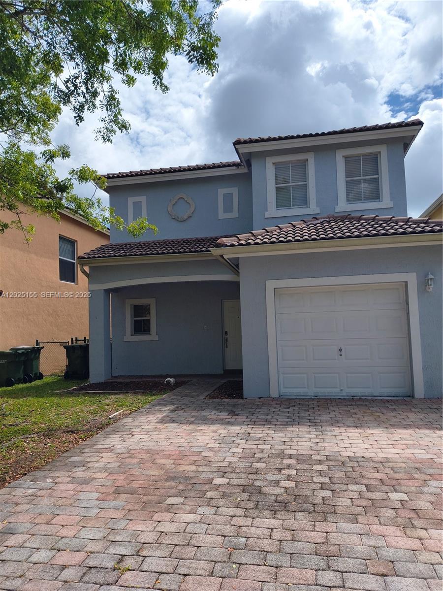 1645 Southeast 20th Road, Unit 1645 Homestead, FL 33035 - Photo 18 of 20 a front view of a house