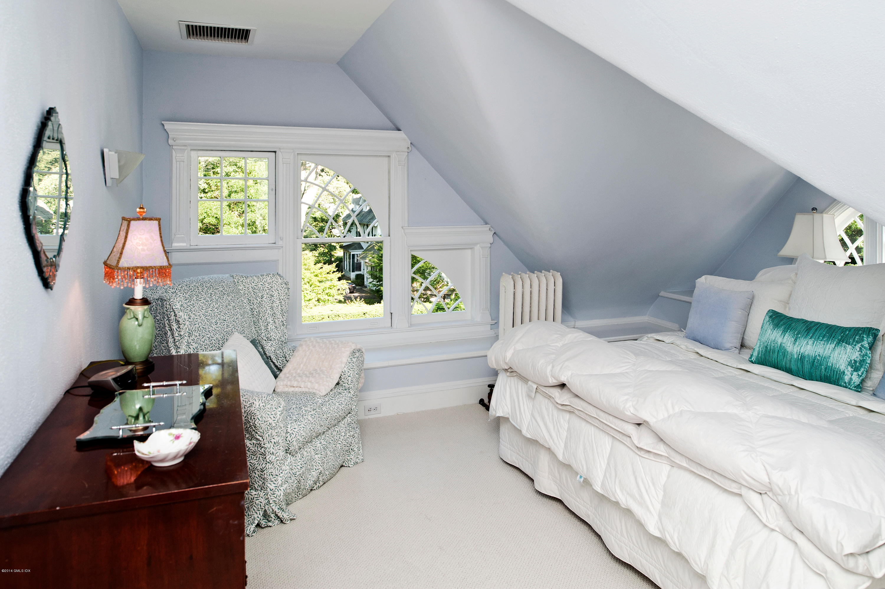 11 Club Road Riverside, CT 06878 - Photo 15 of 16 a bedroom with furniture and a window